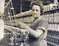 A worker  ring spinning at Lilac Mill, 1940.