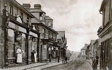 A historic view of Leiston Market Place in Suffolk. One of the postcards visitors will be able to see using a computer.